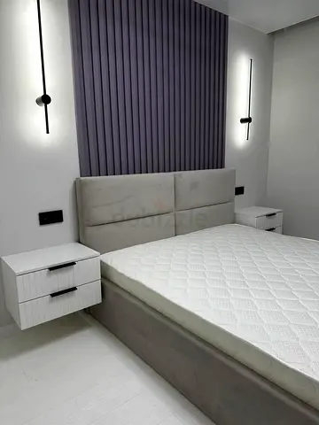 Modern upholstered queen bed with optional side tables