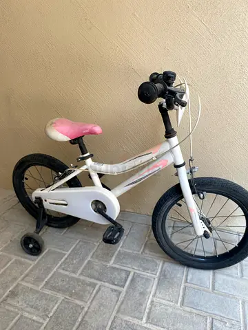 Kids white & pink bicycle with training wheels - good condition