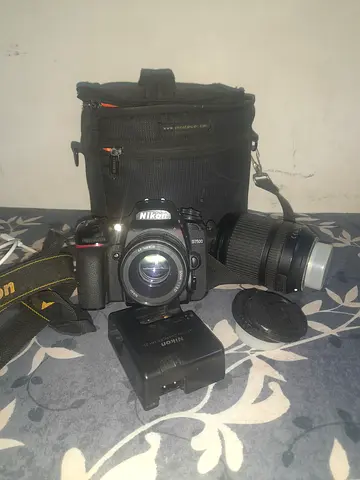 Nikon DSLR kit with 18-55 & 70-300 lenses, charger and bag