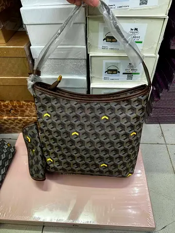 Christy Ng Brown patterned shoulder bag with detachable wristlet