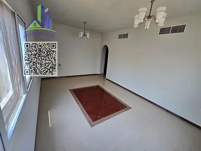 The finest one-bedroom apartment in Al Butina, Sharjah, featuring a spacious layout, central AC, balcony, practical design, and a prime location with
