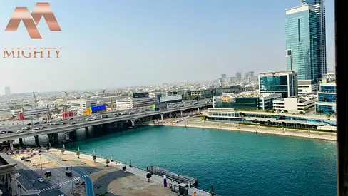 شقة مفروشة بغرفة نوم واحدة | برج نورا | إطلالات على القناة والمدينة