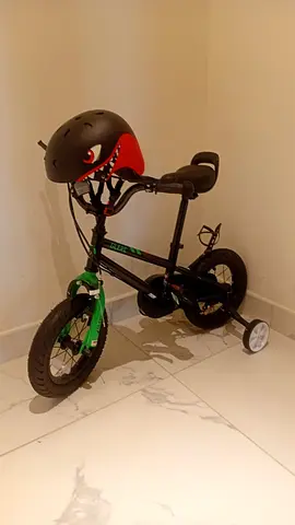 Boys bike for sale with helmet included (age 2-6)