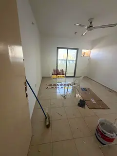 Al Nojoom Tower, Al Majaz 2. Spacious 3-bedroom apartment with split AC, balcony, 3 bathrooms, and l