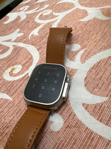 Pre-owned Apple smartwatch Ultra 1 with leather strap - great condition