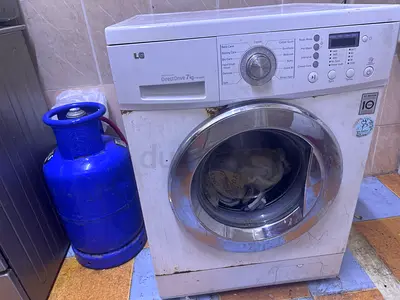 LG 7kg Front Load Washing Machine - Used, Working (Needs Cosmetic Care)