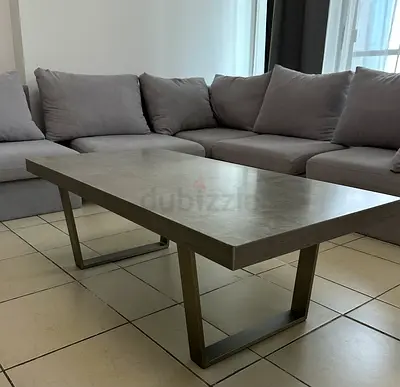 Modern concrete-look rectangular coffee table with metal legs