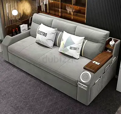 Modern grey 3-seater sofa with built-in side tables and storage