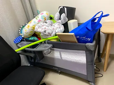 Baby crib with mattress and other baby stuff, pillows, toys and more