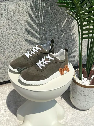 Casual olive green suede sneakers - lightly used, size not specified