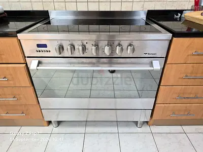 Stainless steel Bompani freestanding electric range with ceramic hob - good working condition