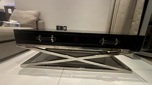Modern black gloss coffee table/tv table with stainless steel X-base