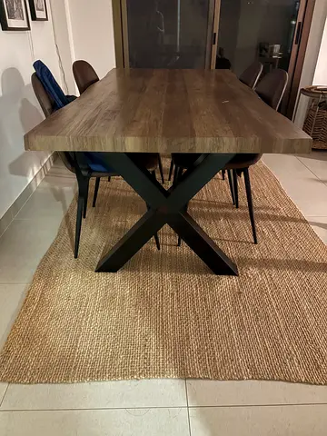 wood dining table with chunky X-base (seats 6) - good condition