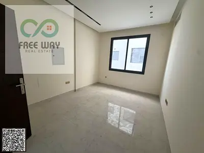 For annual rent in Ajman: excellent 2-bedroom apartment with a living room—first-time occupancy.