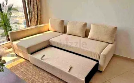 IKEA L shap Sofa store cum bed you can fix the storage