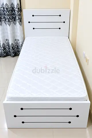 Brand new single wood Bed including mattress available