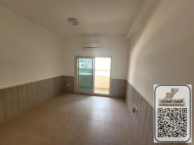 A distinctive one-bedroom apartment with a living room for annual rent in Al Rawda 2.