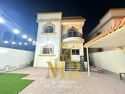 A distinctive villa for sale in Al Rawda 2, situated on a corner plot (street and sikkah) in a strategic location near Sheikh Ammar Street; the price