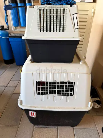 Two sturdy plastic pet carriers (small and large) - good condition