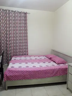 Master bedroom with attached Bathroom available for Family or couple in International City