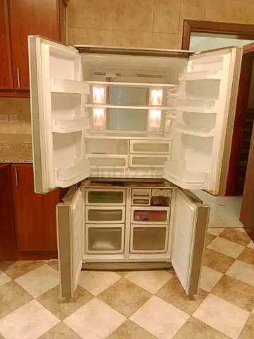 Spacious French Door Refrigerator with Bottom Freezer - Good Condition