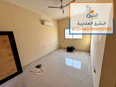 Al-Rawdah 1, near Kenz Mall: Spacious ground-floor unit with split air conditioning, offered at a re