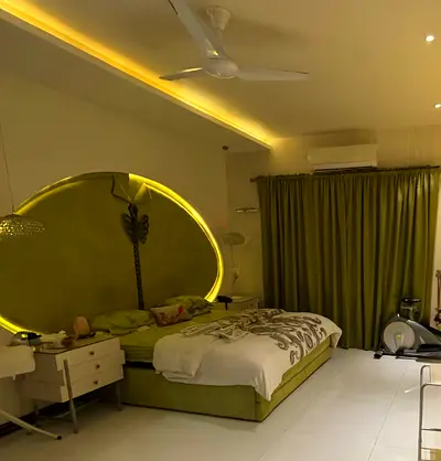 Green bed set with 2 side tables, no head board. Bed has storage! Comes with matching curtains too!