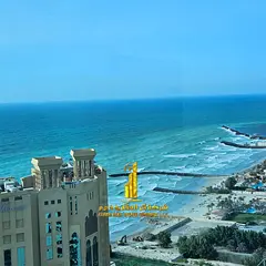 Luxury 3-bedroom apartment with a living room and balcony, featuring a sea view. Available for month