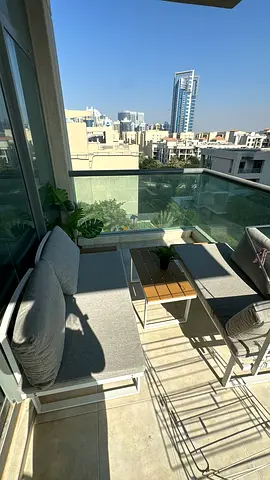 4 seater (2 pieces) with a table. Balcony furniture with Cushions and table: Good Condition