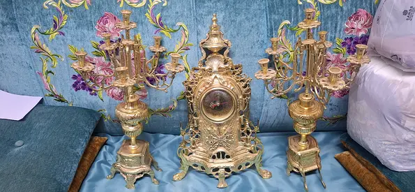 Antique clock and candle chandelier