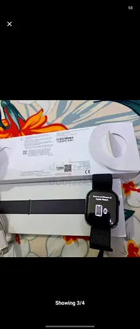 Apple Watch Series (with magnetic charger and extra strap) - Good working condition . With extra ban