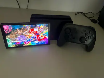 Oled nintendo switch with pro controller and games