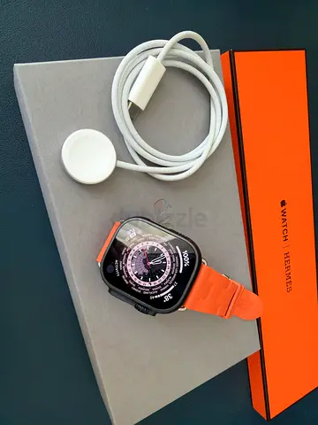 Apple Watch Ultra with Hermès Orange Strap - Complete Box & Charger