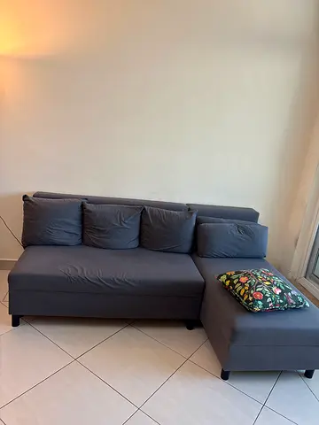Grey L-shaped 3-seater Sofa cum bed