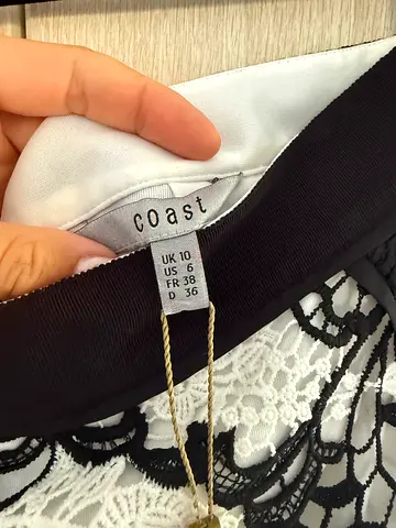 Coast women's black and white lace pencil skirt, UK10. Brand new with tags