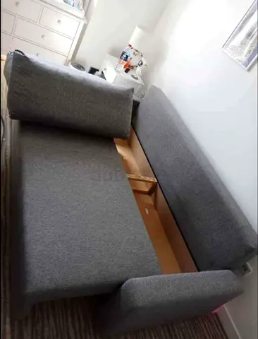 Grey fabric sofa bed with storage, good condition