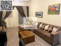 One-bedroom apartment with a living room at Ajman One Tower 5; features a closed kitchen, two bathro