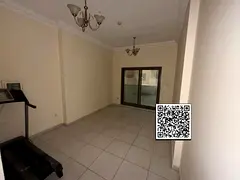 Spacious 1BHK Apartment with Balcony for Rent | Paradise Lake Tower B5, Emirates City, Ajman .