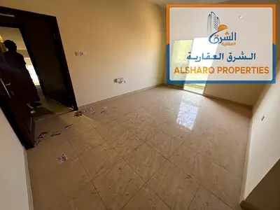 Spacious 1-bedroom apartment with a living room and balcony in Al Nuaimiya 2; prime location with excellent amenities—23,000.
