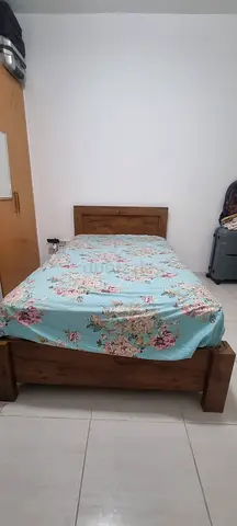 Solid wooden single bed frame with headboard - good condition with mattress