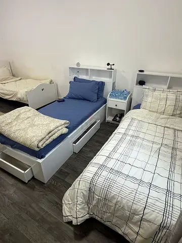 White single bed frame with headboard storage - good condition
