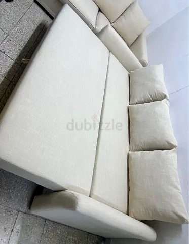 Comfortable Cream Fabric Sofa Bed with Cushions