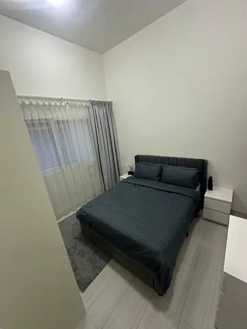 Modern upholstered queen bed with mattress