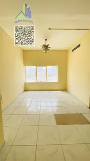 The finest and most beautiful two-bedroom apartment for annual rent in Ajman Corniche, featuring a l
