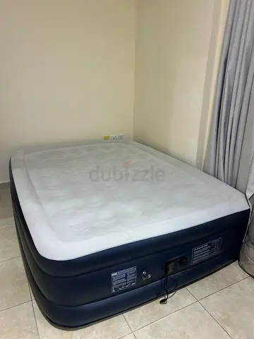 Queen-size Inflatable Air Mattress with Built-in Pump - Good Condition