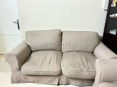Light beige 2-seater sofa, comfortable used condition
