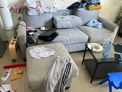 Light grey 3-seater sofa with ottoman - good condition