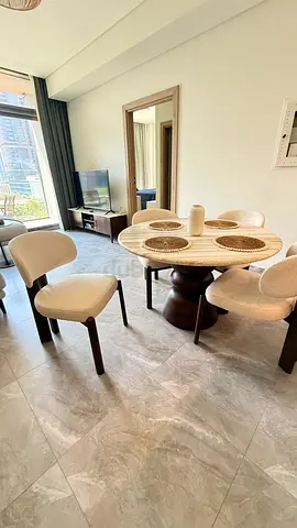 Round marble and wooden dining table with 4 upholstered chairs - modern set