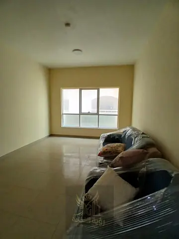 Two Bedrooms and Living Room for Annual Rent in Al Qasimia A well-located apartment in Al Qasimia, conveniently situated next to Mega Mall