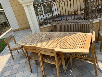 Solid teak wood outdoor garden set extendable dining table and a bench